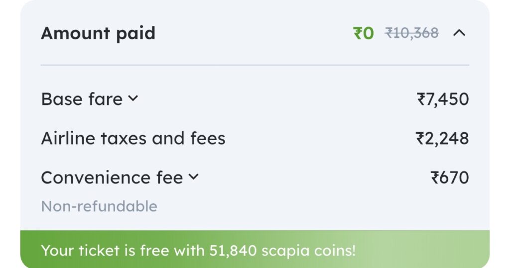 The image shows a breakdown of flight costs with the total amount paid being ₹0, reduced from ₹10,368. The breakdown includes a base fare of ₹7,450, airline taxes and fees of ₹2,248, and a convenience fee of ₹670, which is non-refundable. A green banner at the bottom states, "Your ticket is free with 51,840 scapia coins!"