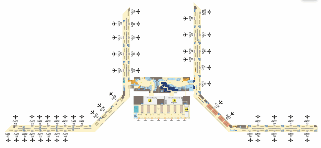The image is a map of an airport terminal layout. It shows various gates labeled with numbers, such as Gate 01, Gate 15, and Gate 62. The terminal has multiple concourses extending from a central area, which includes sections for domestic and international security, emigration, and other facilities. Airplane icons are positioned next to the gates, indicating where planes are located. The map includes pathways and areas for passenger movement within the terminal.