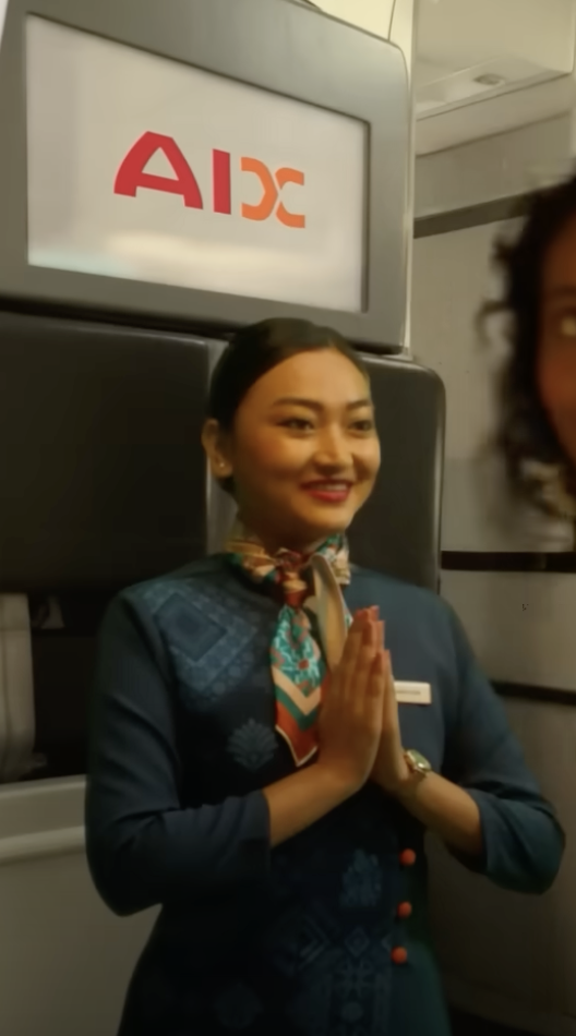 a woman in a blue uniform