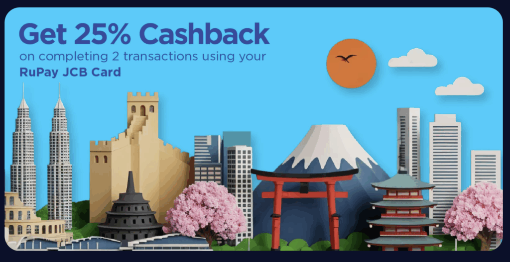 The image is an advertisement featuring a promotional offer for a RuPay JCB Card. It shows a colorful collage of iconic landmarks, including skyscrapers, a traditional pagoda, a torii gate, and a mountain resembling Mount Fuji. There are cherry blossom trees and a bright orange sun with a bird silhouette in the sky. The text reads, "Get 25% Cashback on completing 2 transactions using your RuPay JCB Card."