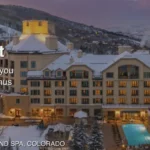 a building with a pool in front of it