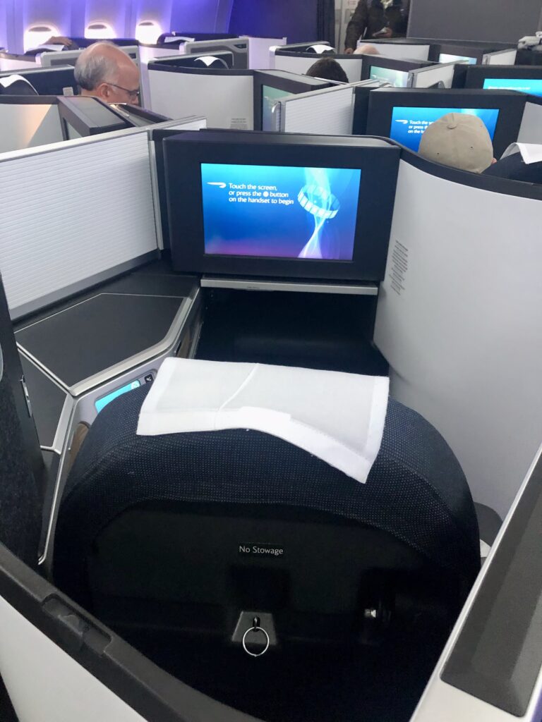 a seat with a screen on it