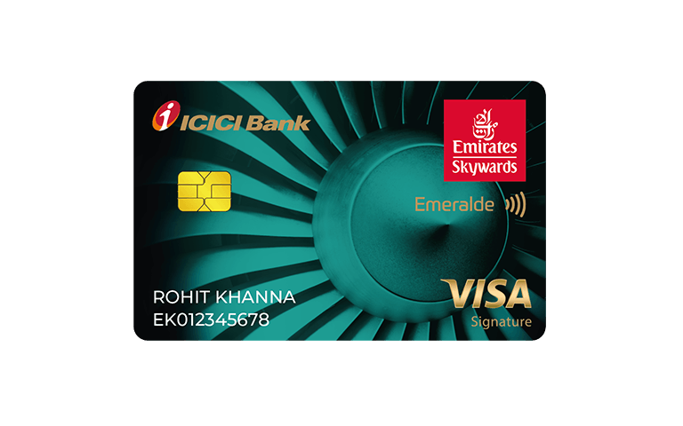 This image shows a credit card from ICICI Bank, co-branded with Emirates Skywards. The card is labeled "Emeralde" and features a Visa Signature logo. It has a teal design with a chip on the left side. The name "Rohit Khanna" and a card number are printed on the bottom left.