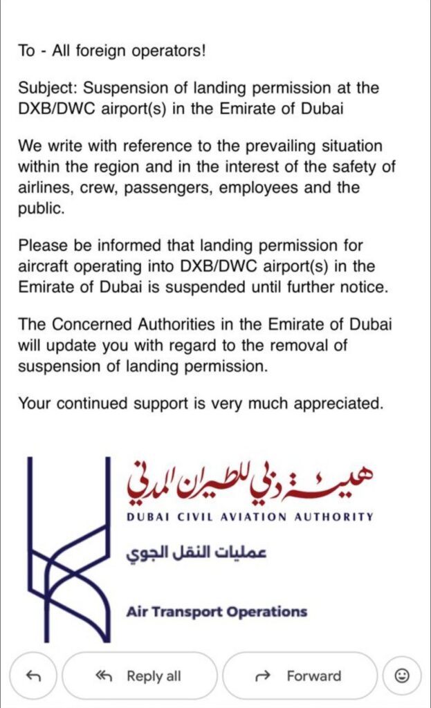 The image is a notice from the Dubai Civil Aviation Authority regarding the suspension of landing permissions at DXB/DWC airports in Dubai. It addresses all foreign operators, citing safety concerns due to the prevailing situation in the region. The notice states that landing permissions are suspended until further notice and assures that updates will be provided by the concerned authorities. The notice includes the logo of the Dubai Civil Aviation Authority and is titled "Air Transport Operations."